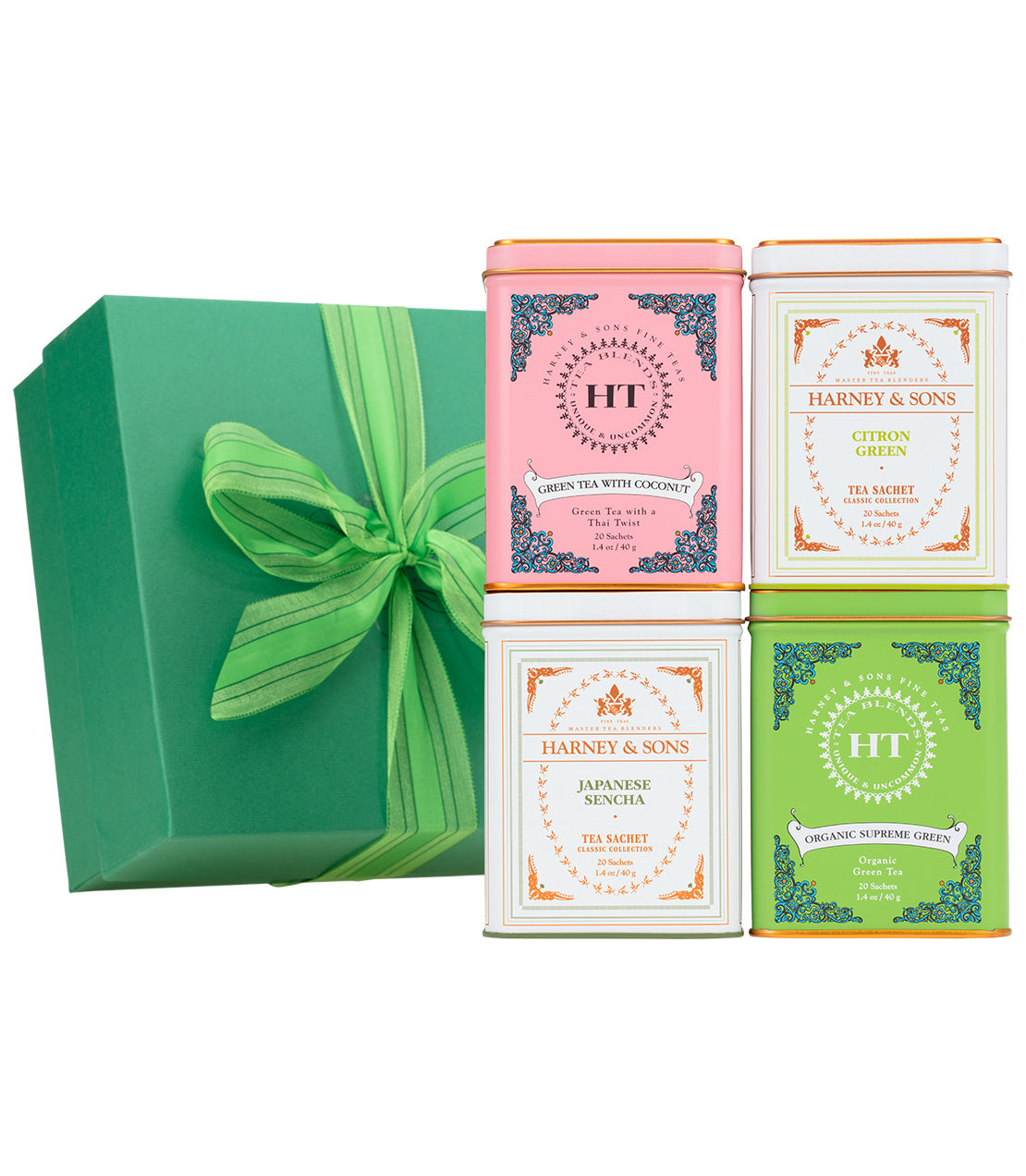 Green tea gift set featuring four decorative tins of various flavors, elegantly packaged in a green box with a ribbon.