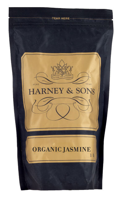 Harney & Sons Organic Jasmine tea packaging, featuring a black bag with gold accents and elegant branding.