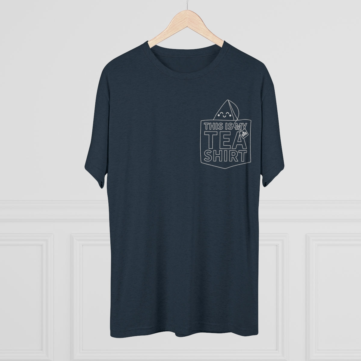 Dark graphic tee featuring the phrase "This Is My Tea Shirt" with a tea bag illustration on the pocket.