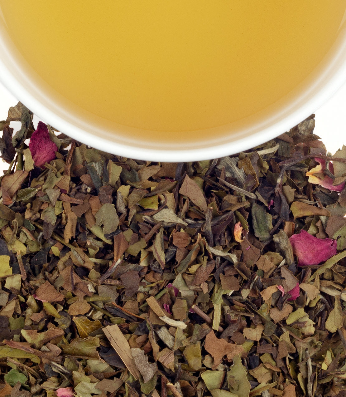 Tin of 30 wedding tea sachets with loose tea leaves and a cup of brewed tea, showcasing a light golden color.